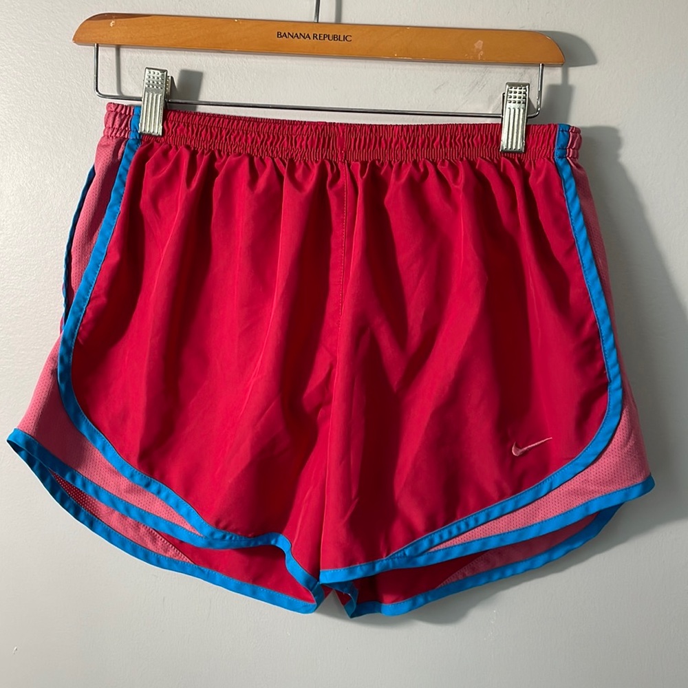 Nike dri-fit running shorts in size medium. Small spot as shown.